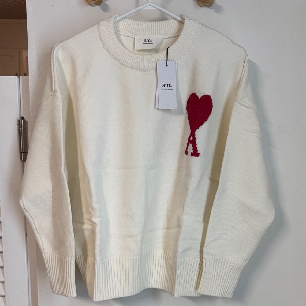 Women's White Sweater with Bold Red Heart Accent